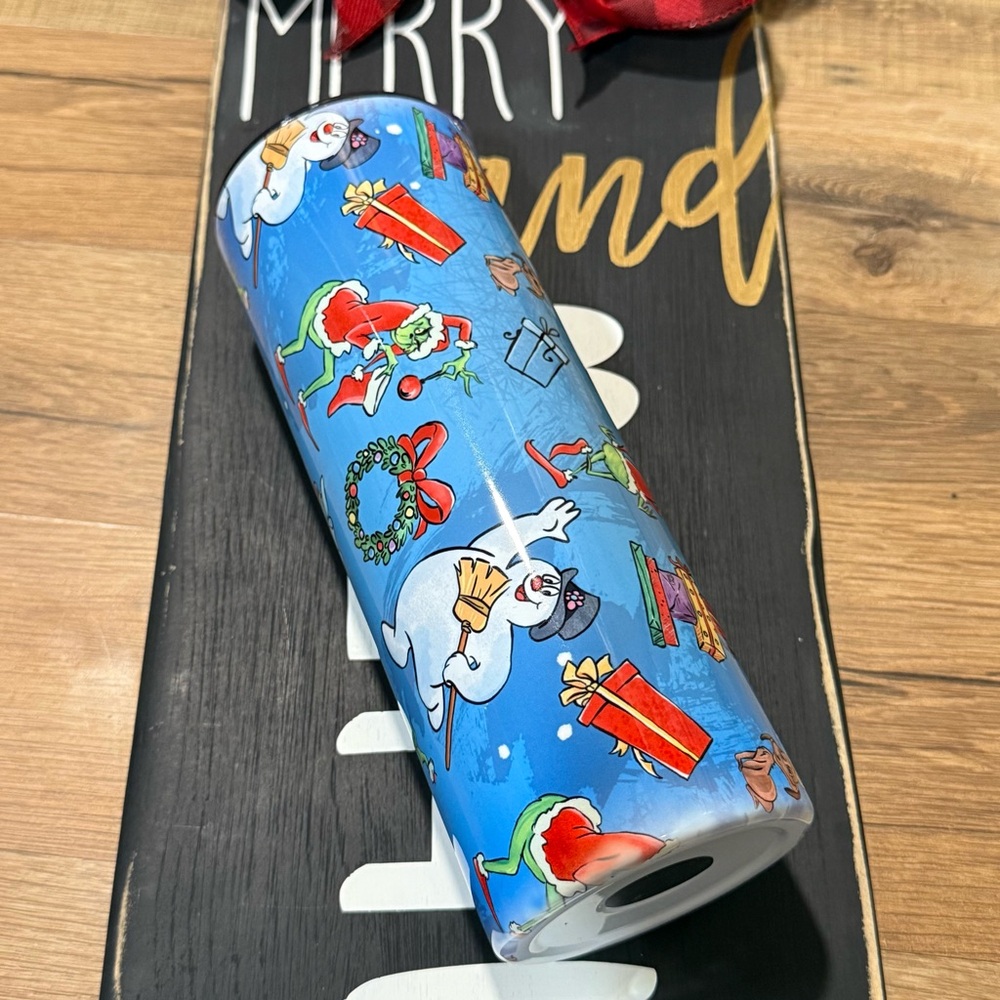 Festive Blue Frosty and Grinch Tumbler